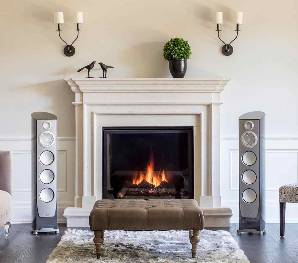 High quality upright speakers in a brick room
